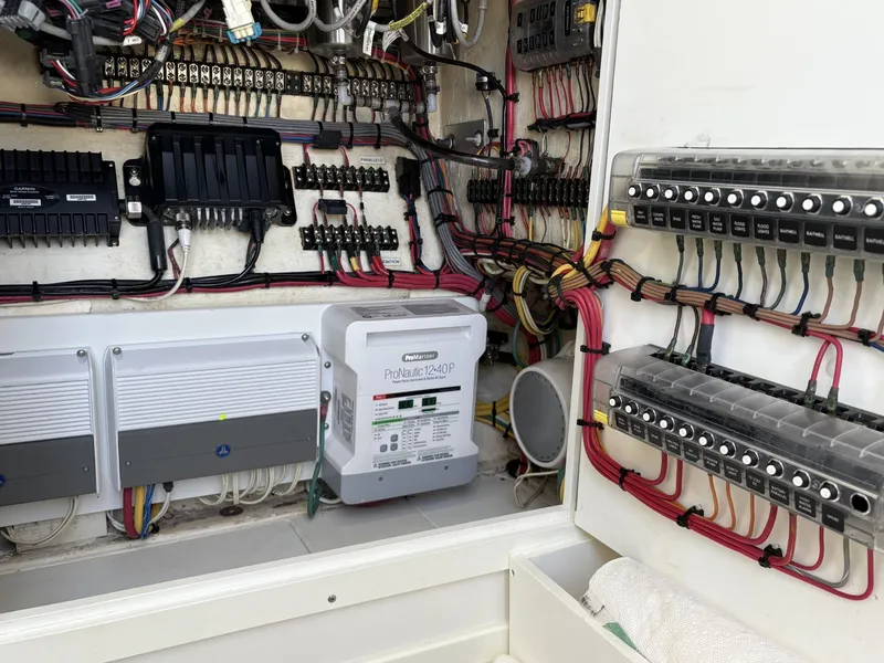 Slide: The Image of 2018 SeaVee 340Z electrical system with wiring and control panels. - 28