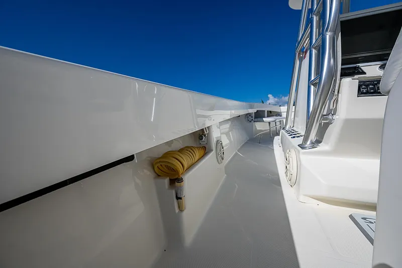 Slide: The Image of 2018 SeaVee 370z boat deck with clear blue sky background. - 31