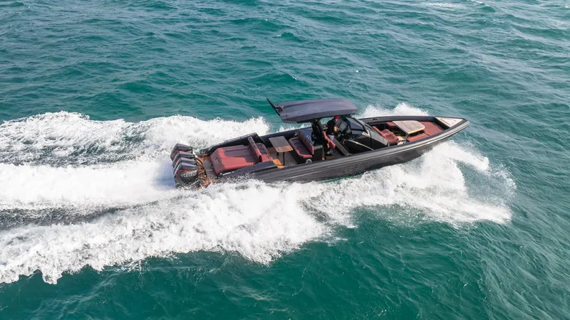 Slide: The Image of Skipper-BSK 42 boat cruising on open water, 2023 model. - 0