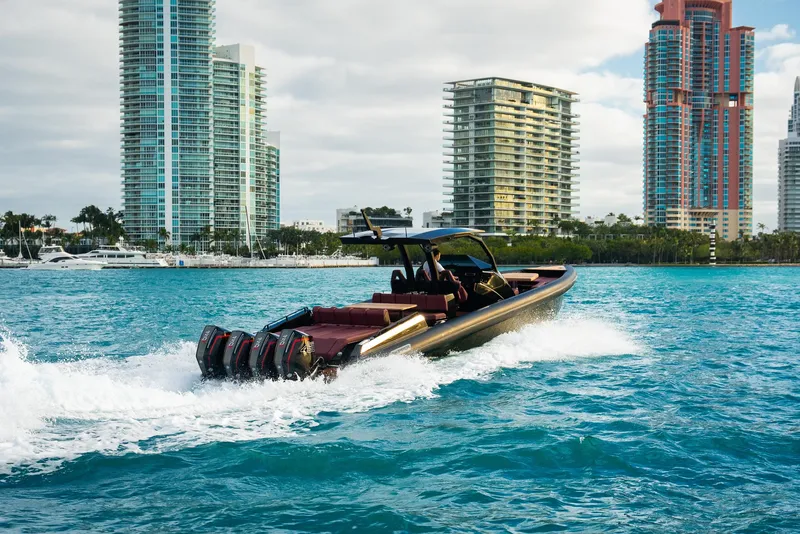 Slide: The Image of Skipper-BSK 42 boat cruising in urban waterfront, 2023 model. - 9