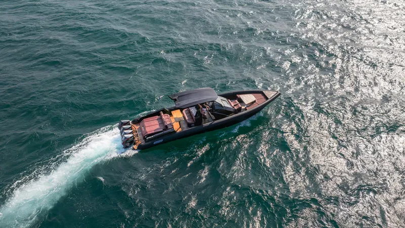 Slide: The Image of Skipper-BSK 42 boat cruising on open water, 2023 model. - 6