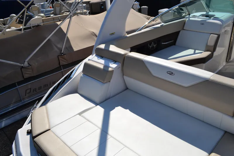 Slide: The Image of 2013 Regal 24 FasDeck boat with spacious, luxurious seating and sleek design. - 20