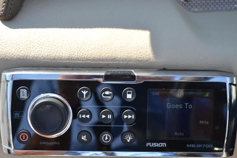 Slide: The Image of Fusion MS-IP700 stereo system on 2013 Regal 24 FasDeck boat dashboard. - 26