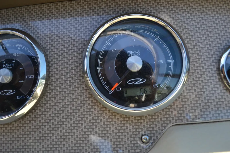 Slide: The Image of Close-up of 2013 Regal 24 FasDeck RPM gauge on dashboard. - 27
