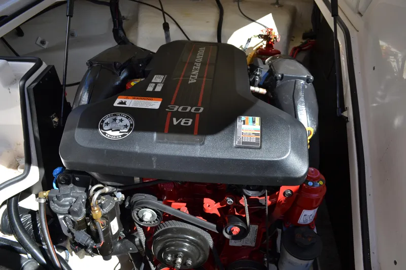 Slide: The Image of 2013 Regal 24 FasDeck engine compartment with Volvo Penta 300 V8 engine. - 29