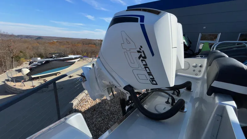 Slide: The Image of 2021 Fountain 34 SC boat with powerful 450 Racing engine, docked outdoors. - 15