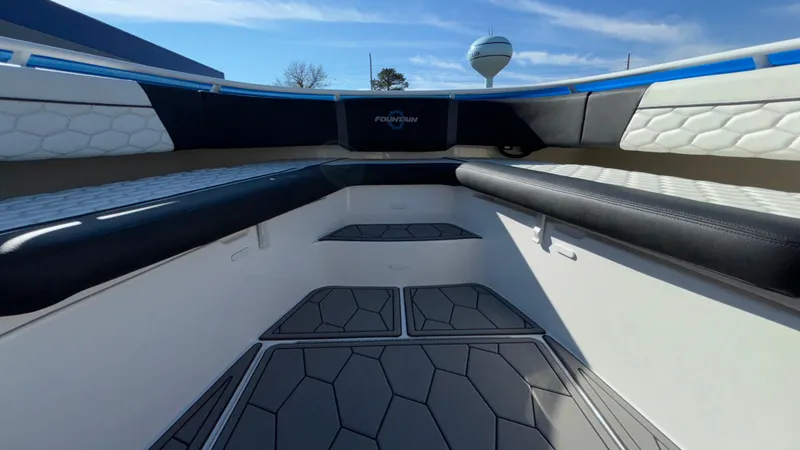 Slide: The Image of 2021 Fountain 34 SC boat interior with sleek seating and modern design. - 23