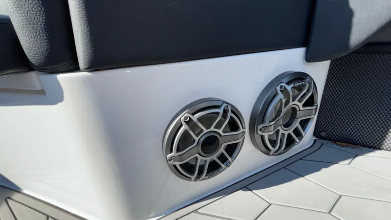 Slide: The Image of 2021 Fountain 34 SC boat speakers on sleek interior panel. - 26