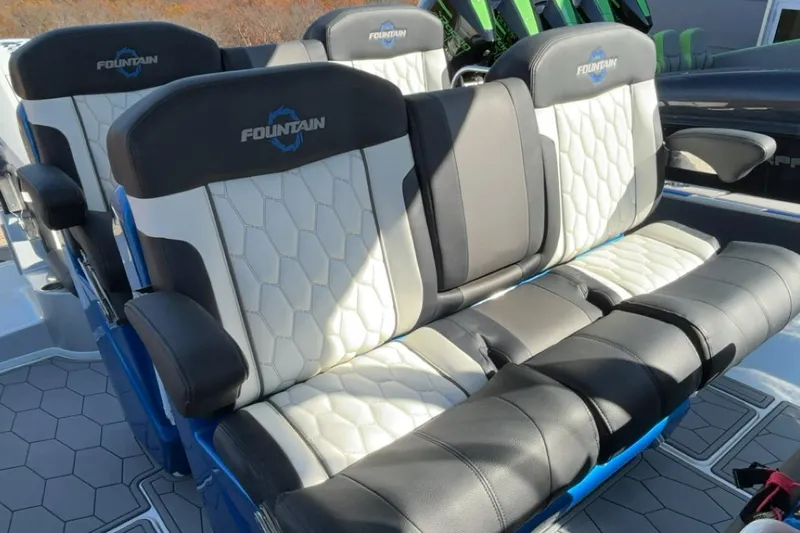 Slide: The Image of 2021 Fountain 34 SC boat seats with black and white upholstery. - 46