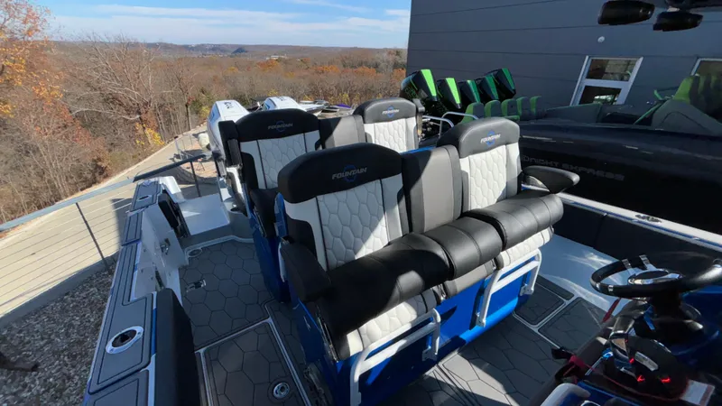Slide: The Image of 2021 Fountain 34 SC boat with luxurious seating and modern design. - 5