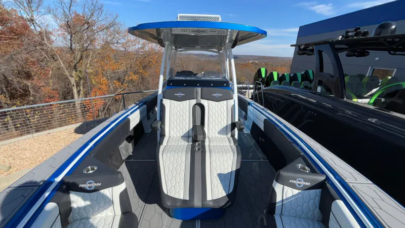 Slide: The Image of 2021 Fountain 34 SC boat with sleek design and modern seating. - 8