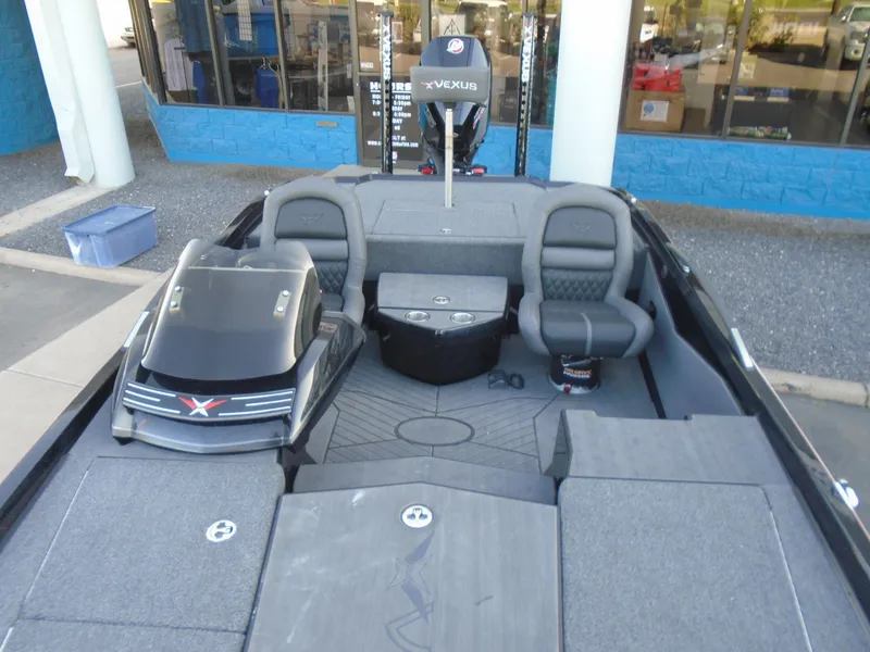 Slide: The Image of 2022 Vexus VX21 boat interior with seating and storage compartments. - 10