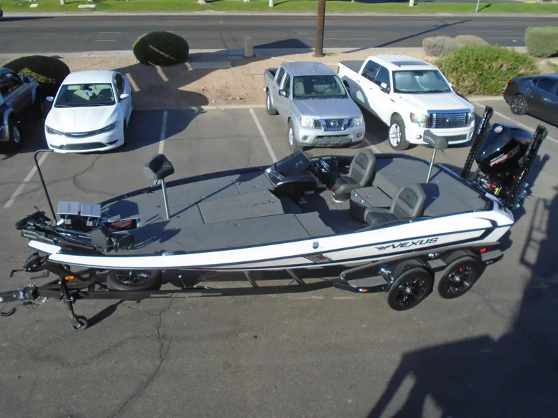Slide: The Image of 2022 Vexus VX21 boat in parking lot, aerial view. - 16