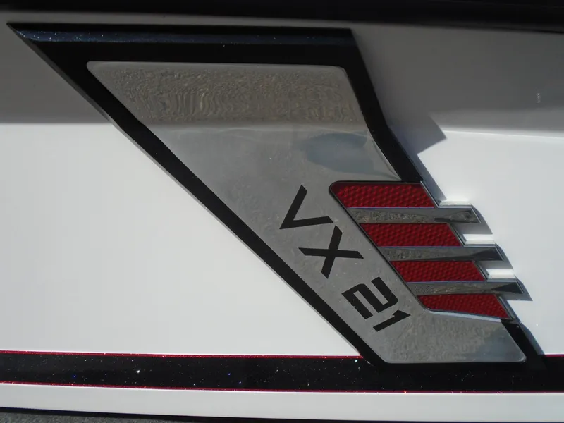 Slide: The Image of 2022 Vexus VX21 logo on a sleek metallic surface. - 17