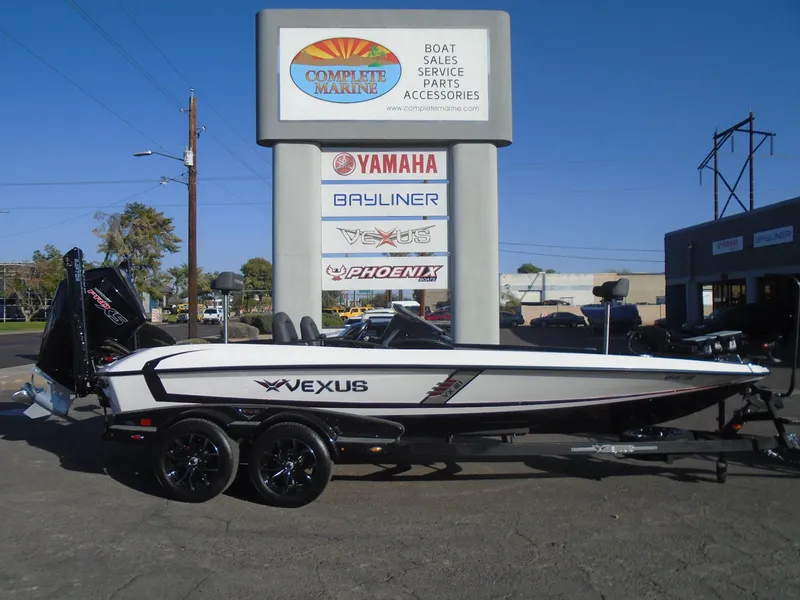Slide: The Image of 2022 Vexus VX21 boat displayed at Complete Marine dealership. - 20