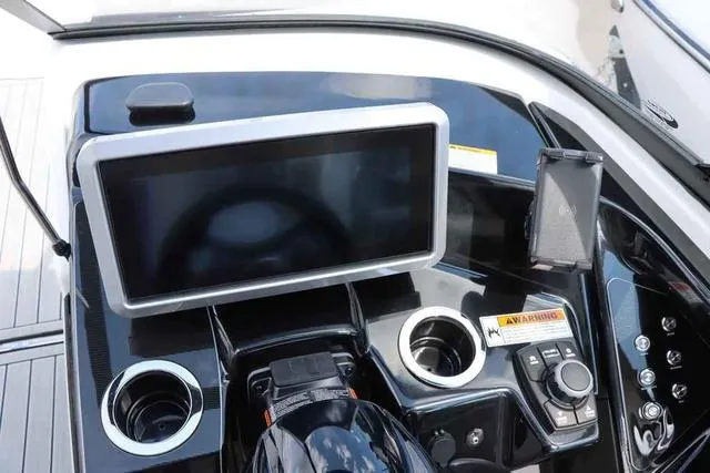 Slide: The Image of 2024 Yamaha Boats 252SD dashboard with touchscreen display and control panel. - 6
