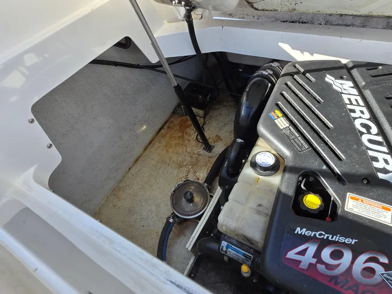 Slide: The Image of Engine compartment of a 2006 Cobalt 262 boat with MerCruiser 496 engine. - 14
