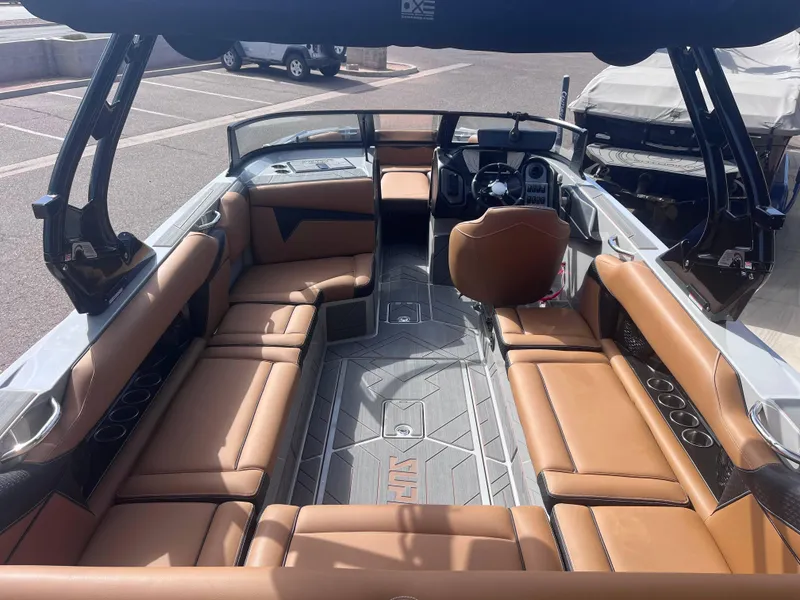Slide: The Image of Luxurious interior of 2025 Supreme S240 boat with tan leather seating. - 4