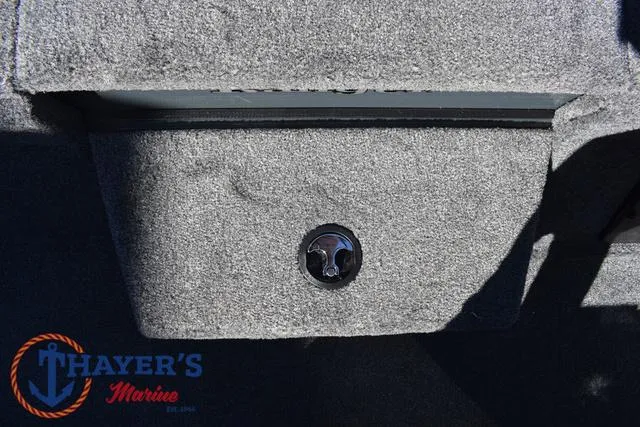 Slide: The Image of Ranger RT198P 2025 boat storage compartment with Thayer's Marine logo. - 18
