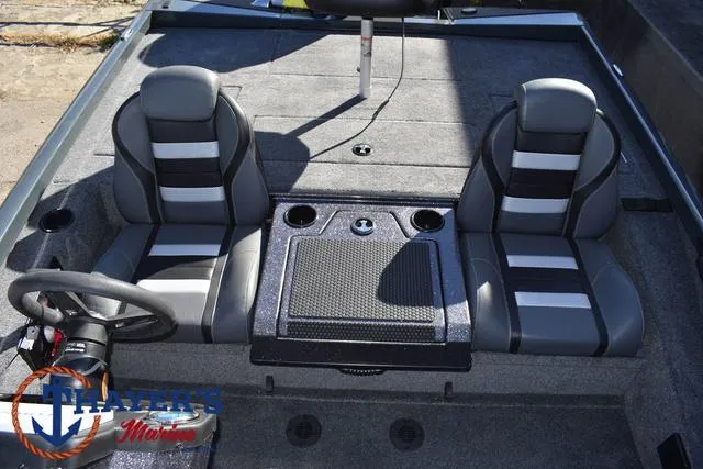 Slide: The Image of 2025 Ranger RT198P boat interior with dual seats and steering wheel. - 22