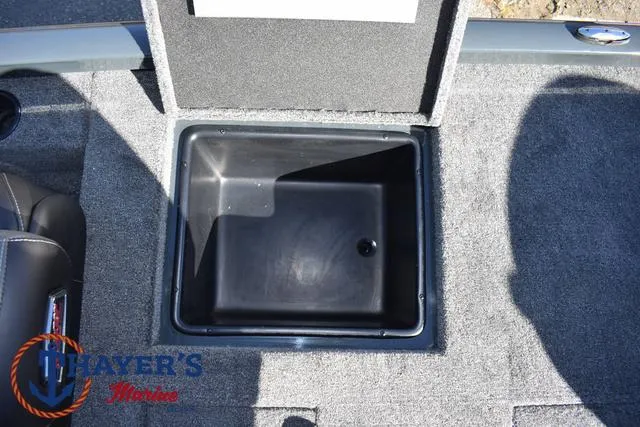 Slide: The Image of 2025 Ranger RT198P boat storage compartment with Thayer's Marine logo. - 29