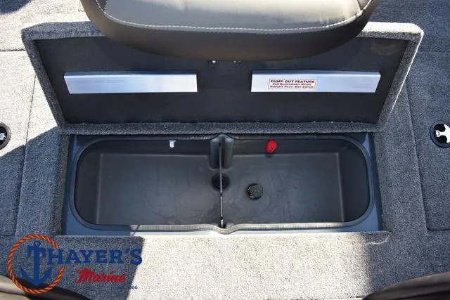 Slide: The Image of 2025 Ranger RT198P boat storage compartment with pump-out feature, Thayer's Marine logo visible. - 31