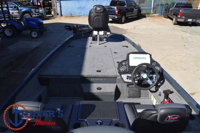 Slide: The Image of 2025 Ranger RT198P boat interior with steering wheel and seating. - 34