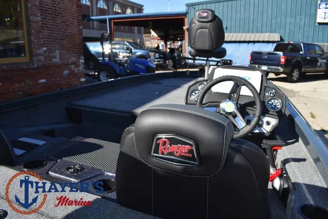 Slide: The Image of 2025 Ranger RT198P boat interior with steering wheel and branded seats at Thayer's Marine. - 35
