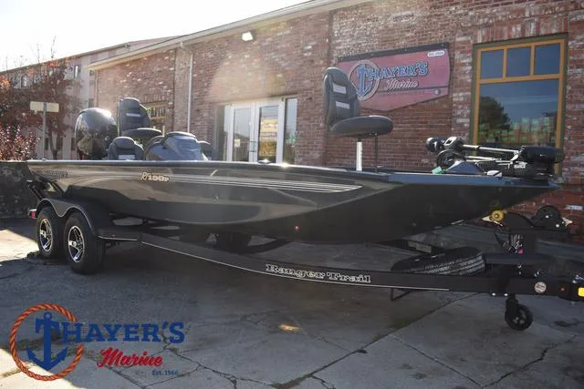 Slide: The Image of 2025 Ranger RT198P boat displayed at Thayer's Marine dealership. - 38