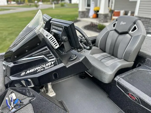 Slide: The Image of 2023 Ranger Z520R boat cockpit with Mercury Pro Team branding and Humminbird electronics. - 14