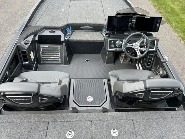 Slide: The Image of 2023 Ranger Z520R boat interior with dual seats, steering console, and advanced navigation displays. - 21