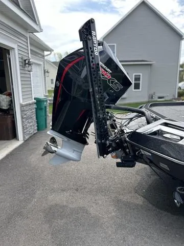 Slide: The Image of 2023 Ranger Z520R boat with powerful outboard motor in driveway. - 4