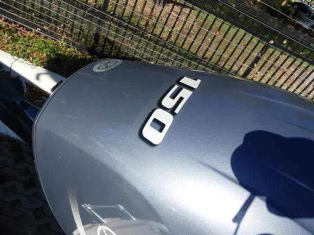 Slide: The Image of 2023 Robalo R200 boat engine with "150" horsepower marking. - 8