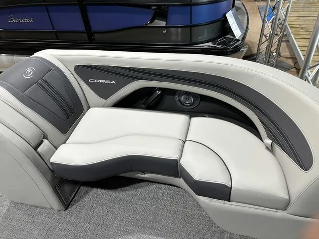 Slide: The Image of 2025 Barletta Corsa 23UC boat interior with sleek, modern seating design. - 11