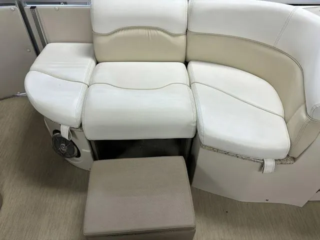 Slide: The Image of Luxurious seating on 2013 Harris ROYAL 250 pontoon boat with beige upholstery. - 11