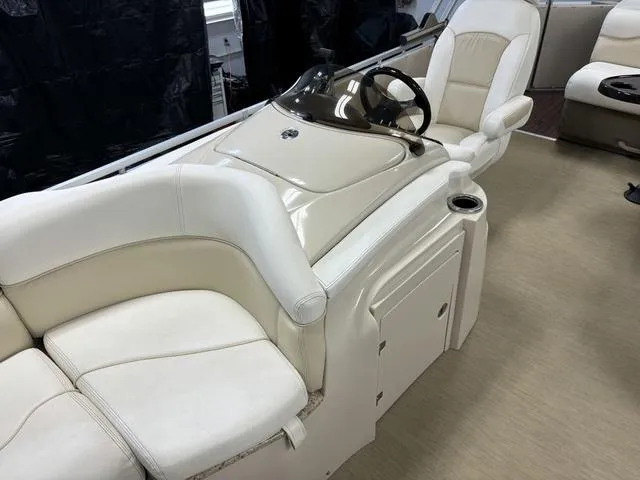 Slide: The Image of Luxurious interior of 2013 Harris ROYAL 250 boat with cream leather seating. - 12
