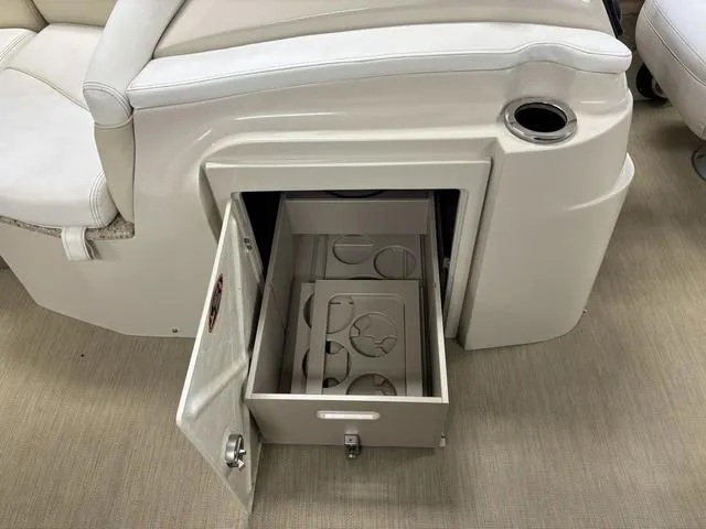 Slide: The Image of Harris ROYAL 250 boat storage compartment with cup holder, 2013 model. - 13