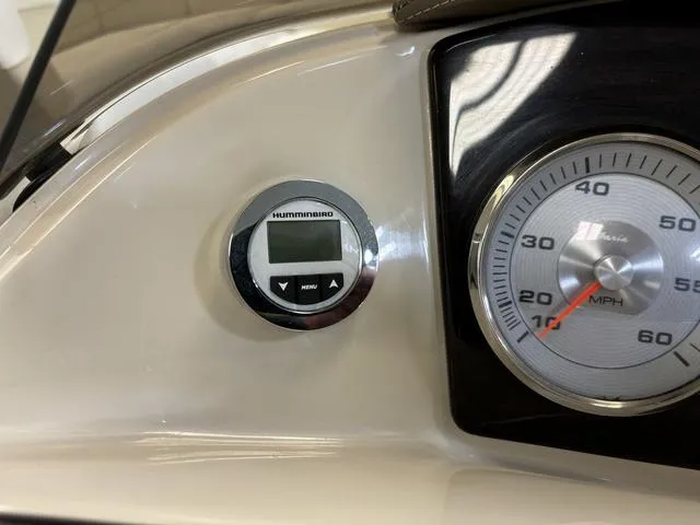 Slide: The Image of Close-up of 2013 Harris ROYAL 250 dashboard with Humminbird display and speedometer. - 16