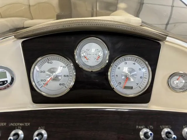 Slide: The Image of Dashboard of 2013 Harris ROYAL 250 boat with gauges and controls. - 17