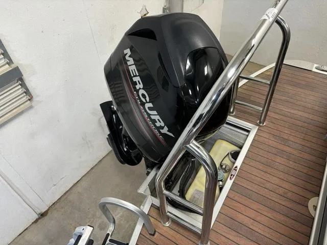 Slide: The Image of Mercury outboard motor on Harris ROYAL 250 boat, 2013 model, with wooden deck. - 27