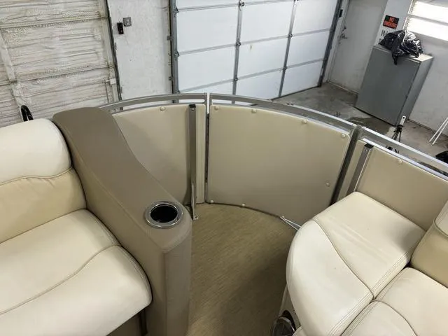 Slide: The Image of Interior of a 2013 Harris ROYAL 250 pontoon boat with beige seating. - 6