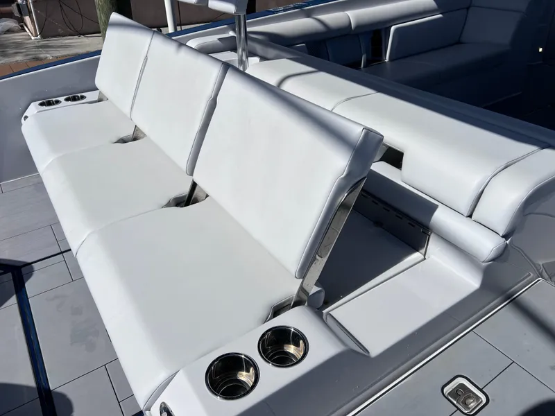 Slide: The Image of Luxury seating on 2022 Aviara AV 32 Outboard boat with cup holders. - 30