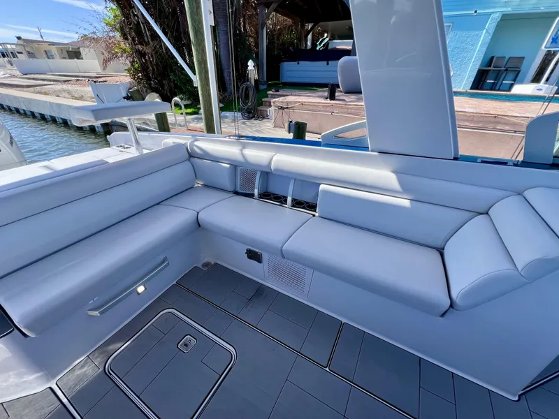 Slide: The Image of Luxurious seating area on 2022 Aviara AV 32 Outboard boat, featuring sleek design and modern amenities. - 34