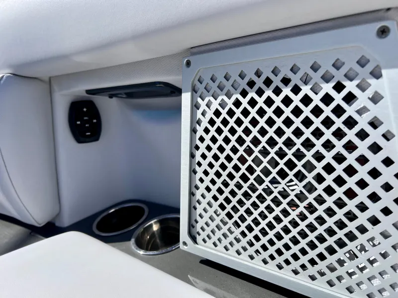 Slide: The Image of Interior detail of 2022 Aviara AV 32 Outboard boat with speaker and cup holders. - 50