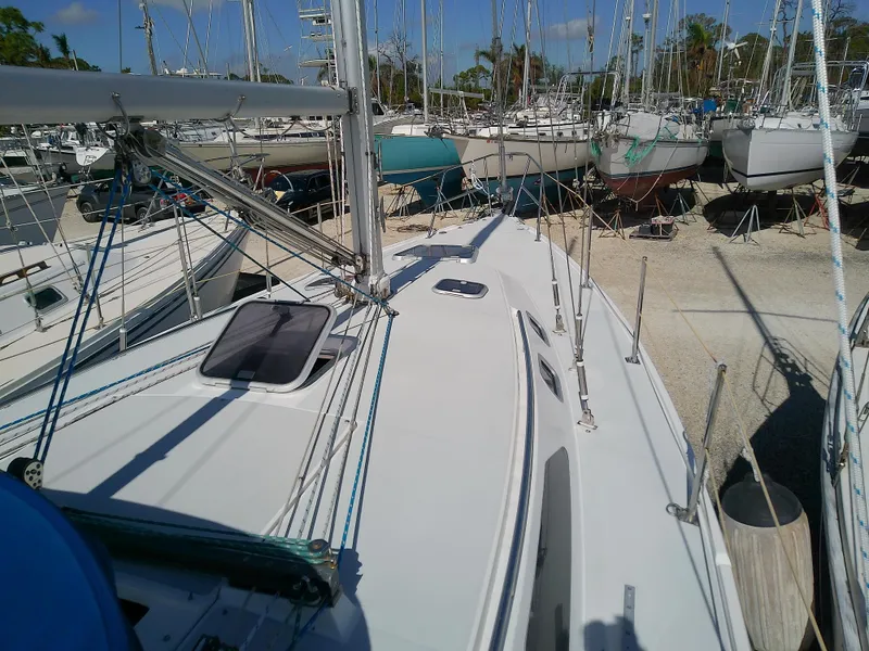 Slide: The Image of Catalina 36 MkII sailboat deck, 1995 model, in a marina with other boats. - 10