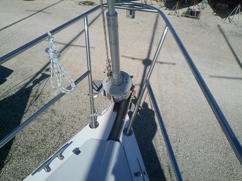 Slide: The Image of 1995 Catalina 36 MkII sailboat bow with stainless steel railing and anchor chain. - 11
