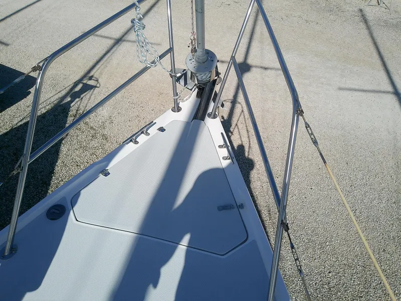 Slide: The Image of Bow of 1995 Catalina 36 MkII sailboat with deck details and railing. - 13
