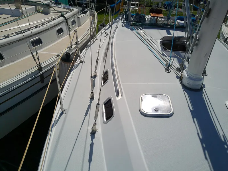 Slide: The Image of 1995 Catalina 36 MkII sailboat deck with rigging and hatches. - 15