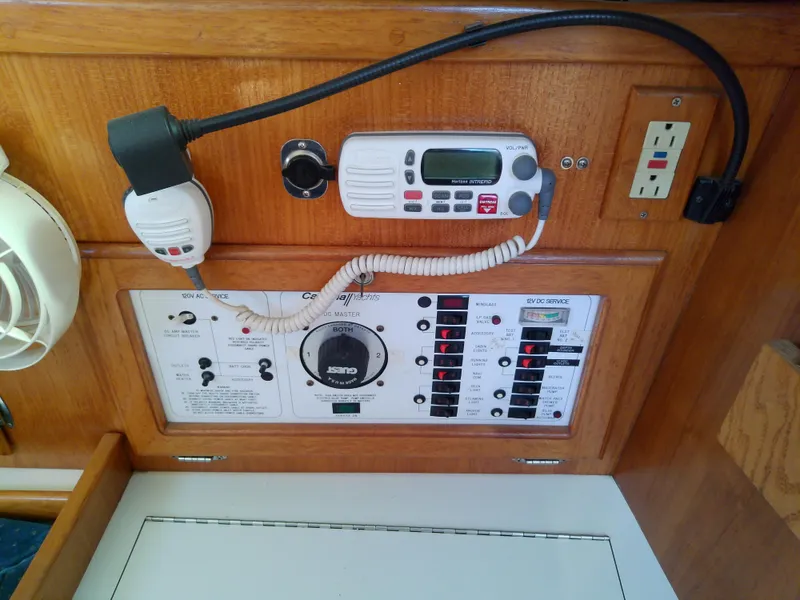 Slide: The Image of Control panel of a 1995 Catalina 36 MkII sailboat with radio and electrical switches. - 34