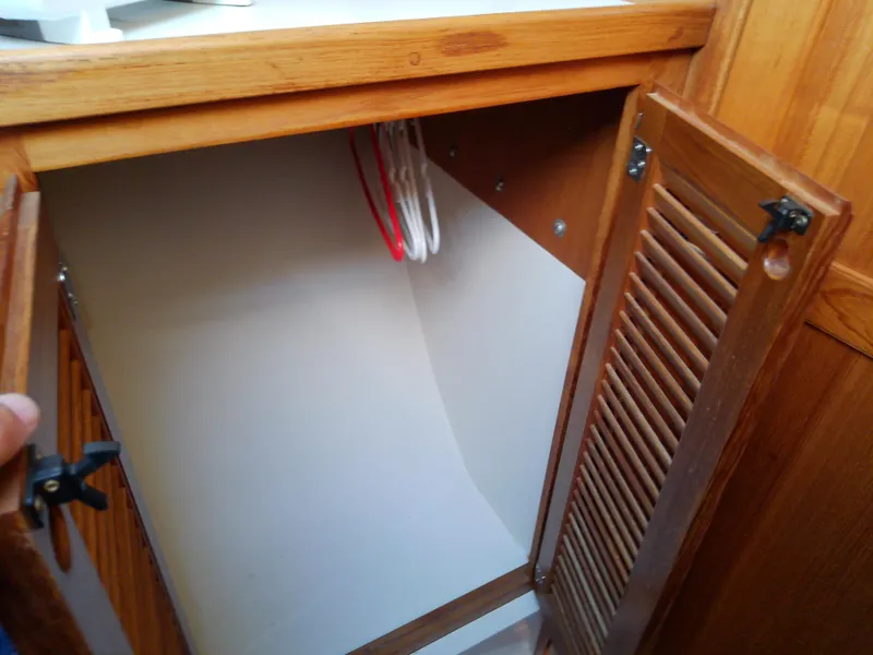 Slide: The Image of Wooden cabinet interior on a 1995 Catalina 36 MkII sailboat. - 39